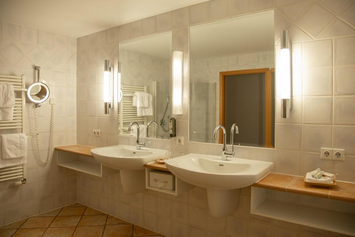 Ein Badezimmer in der Unterkunft Hotel Deimann