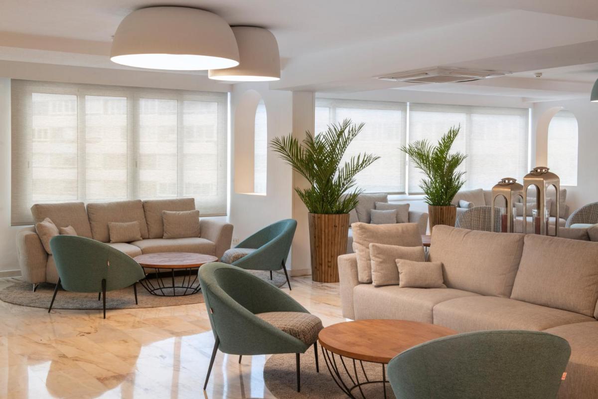 Zona de estar de Salles Hotels Marina Portals