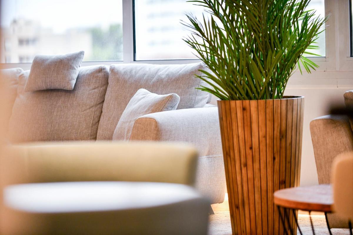 Zona de estar de Salles Hotels Marina Portals