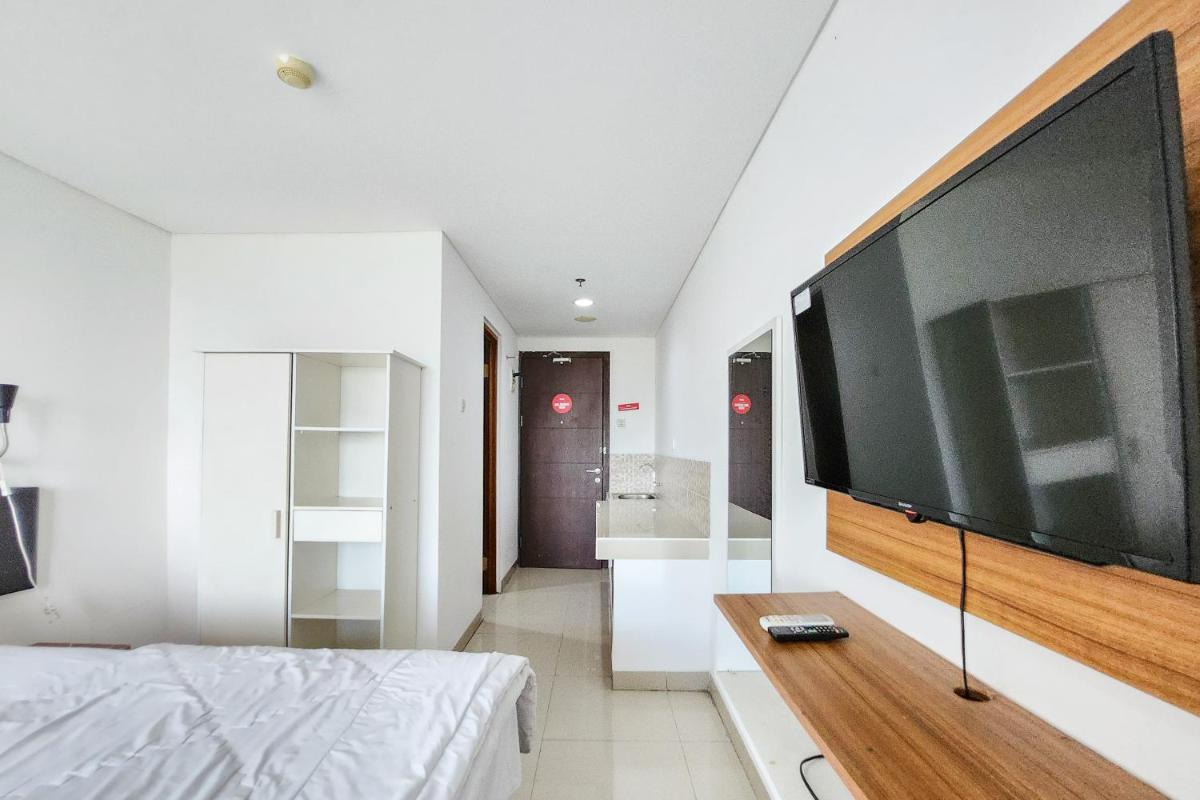 RedLiving Apartemen Enviro - Aurora Rooms - Housity
