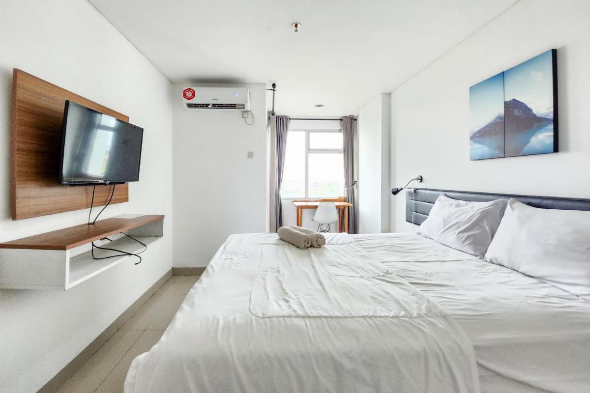 RedLiving Apartemen Enviro - Aurora Rooms - Housity