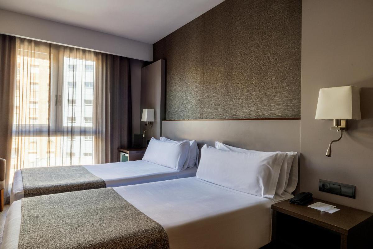 Cama o camas de una habitación en Catalonia Atenas