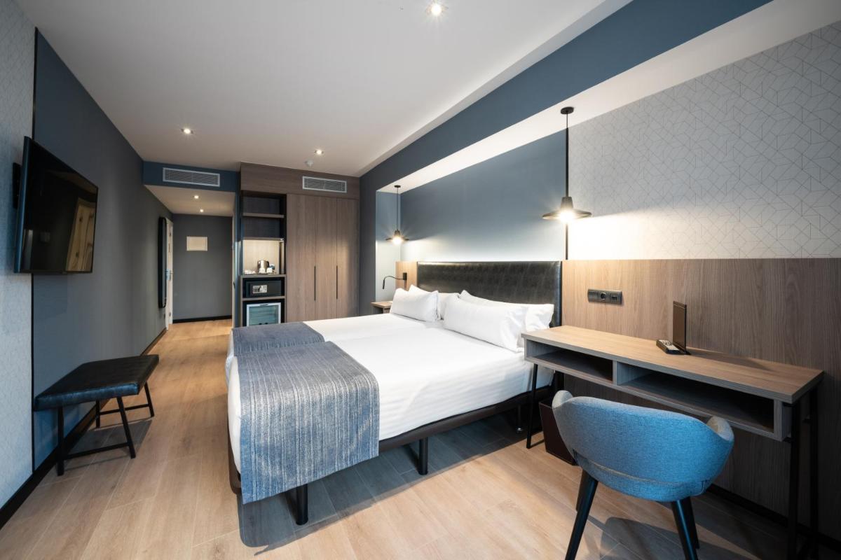 Cama o camas de una habitación en Catalonia Atenas