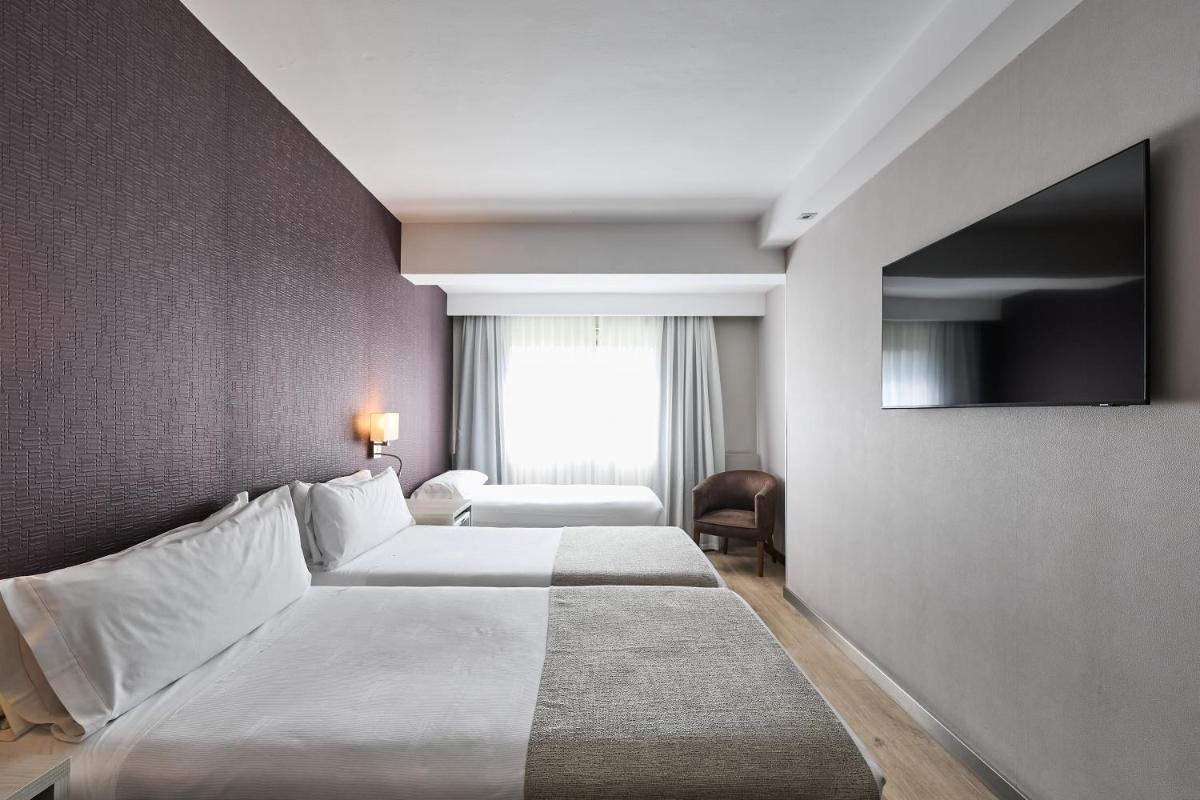 Cama o camas de una habitación en Catalonia Atenas