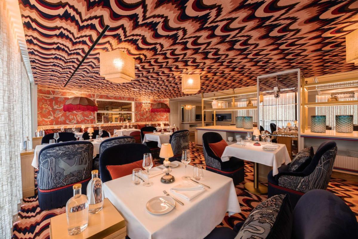 Um restaurante ou outro lugar para comer em Legacy Hotel Cascais, Curio Collection By Hilton