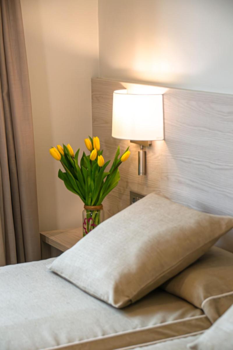 Cama o camas de una habitación en Hotel Marina
