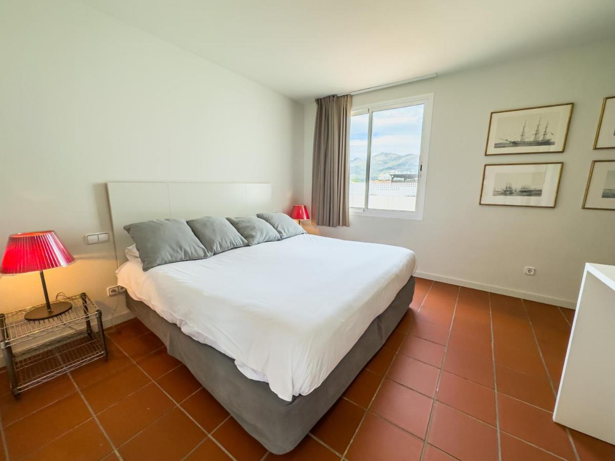 Cama o camas de una habitación en Hotel Marina