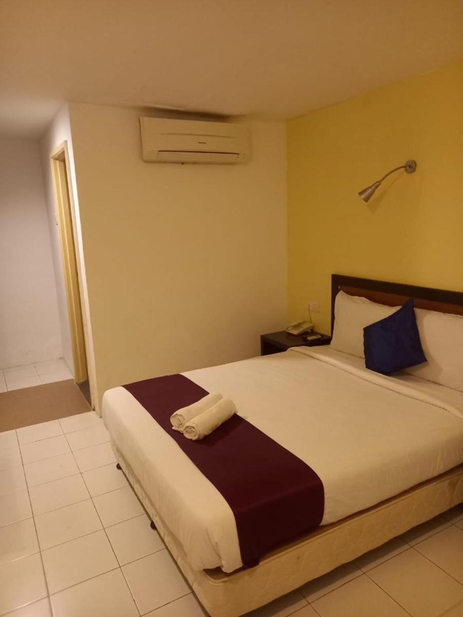 Syajie Koptown Hotel - Housity