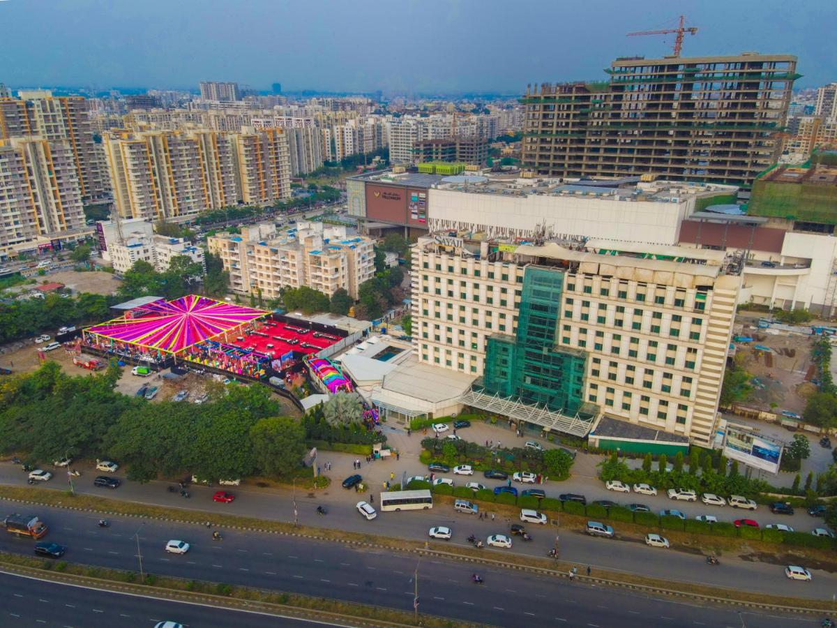 an overhead view of a city with a large building at Sayaji Pune in Pune