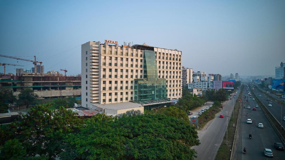 a view of a city with a tall building at Sayaji Pune in Pune