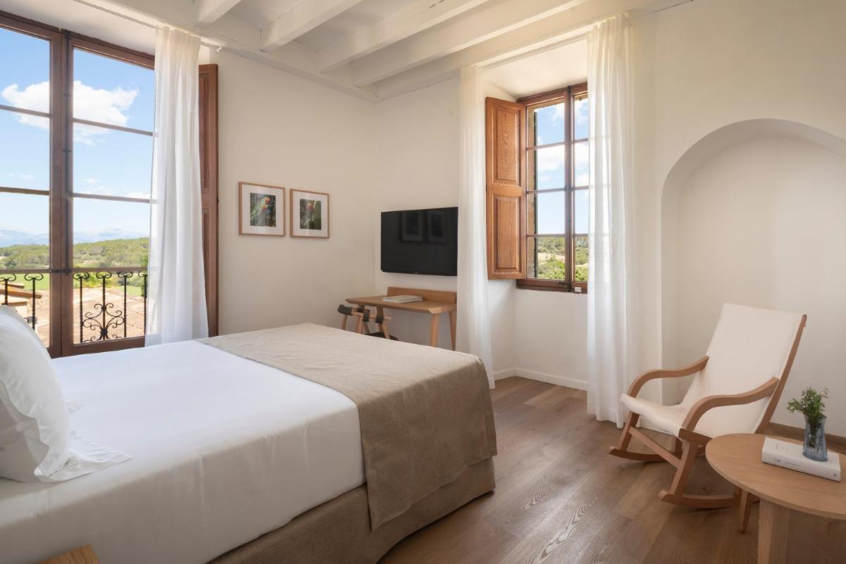 Cama o camas de una habitación en Es Figueral Nou Hotel Rural & Spa - Adults Only - Over 12