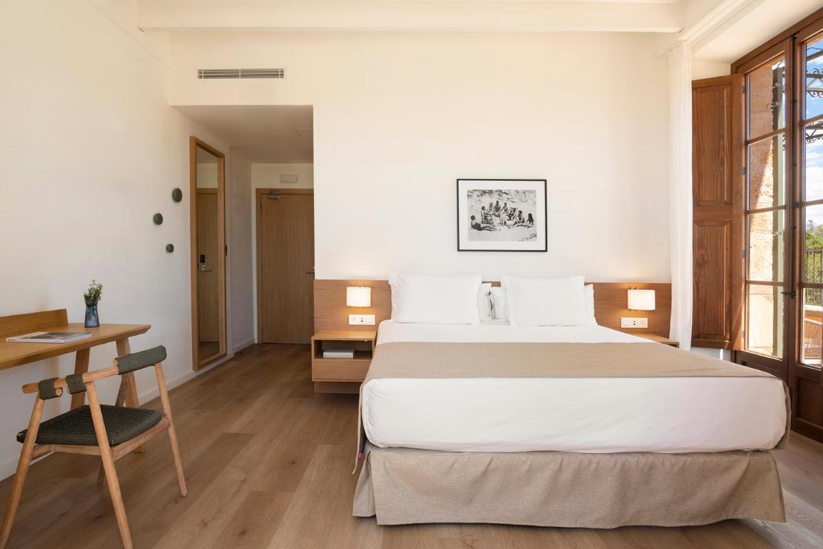 Cama o camas de una habitación en Es Figueral Nou Hotel Rural & Spa - Adults Only - Over 12