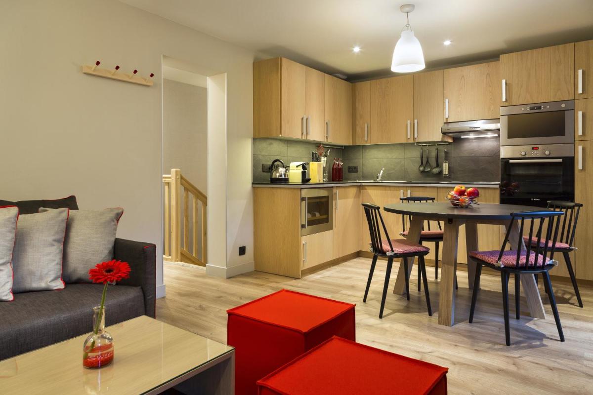 Cuisine ou kitchenette dans l'établissement Appartements de l'Héliopic