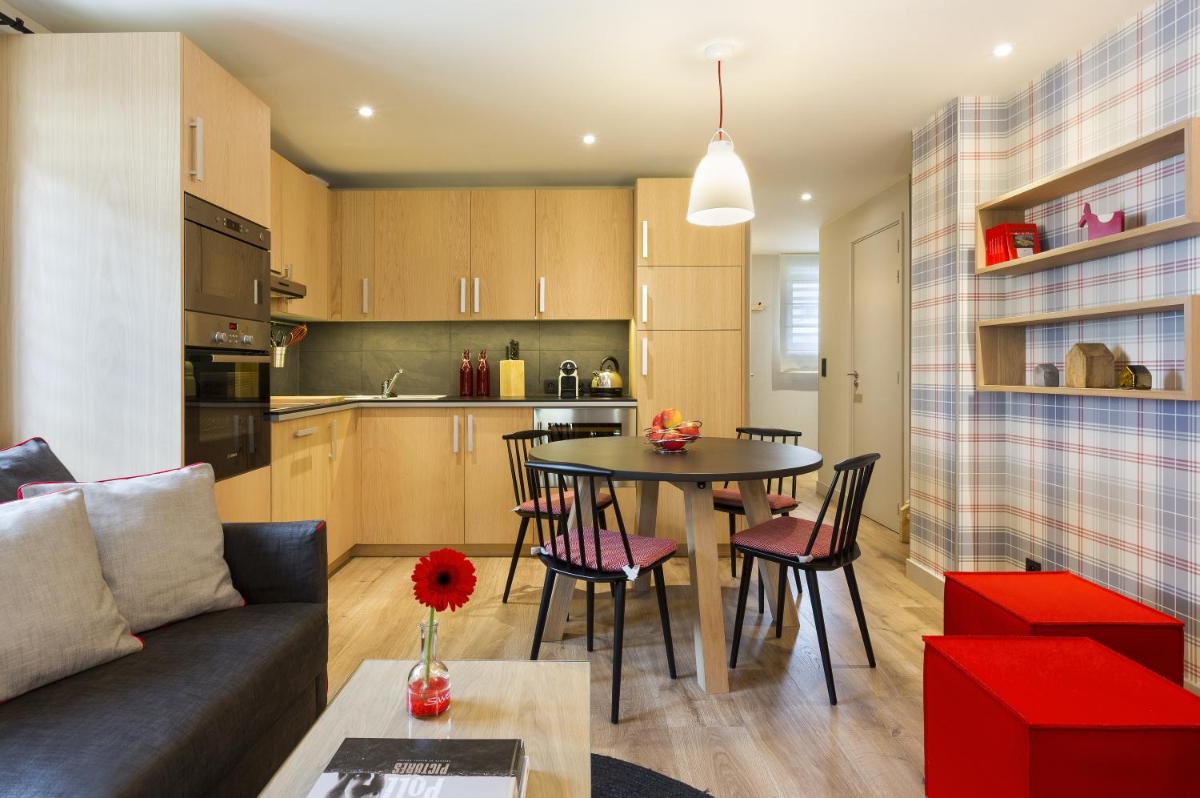Cuisine ou kitchenette dans l'établissement Appartements de l'Héliopic