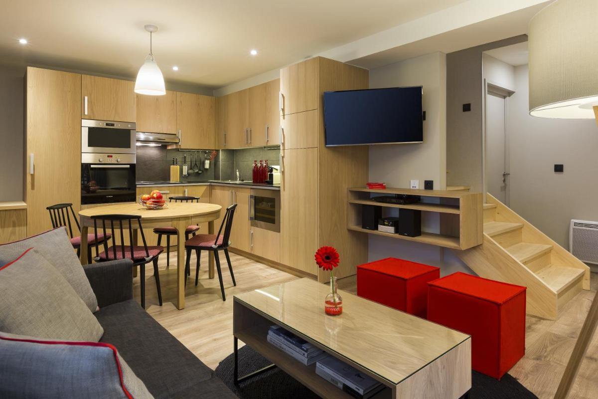 Cuisine ou kitchenette dans l'établissement Appartements de l'Héliopic