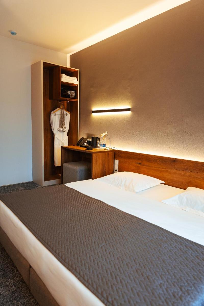 DUO Futuro Hotel Bishkek - Housity