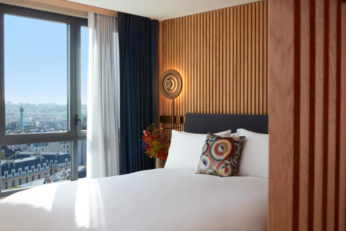 Un ou plusieurs lits dans un hébergement de l'établissement SO/ Paris Hotel