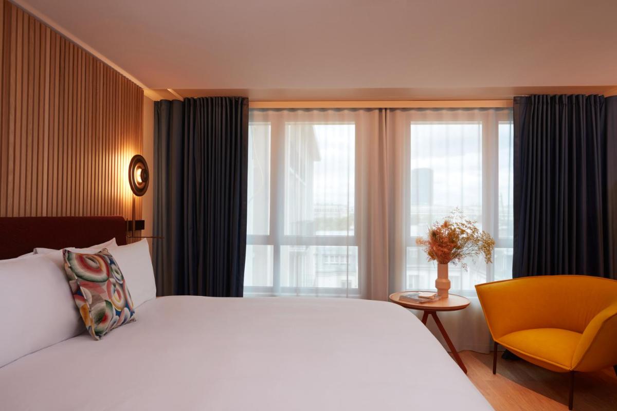 Un ou plusieurs lits dans un hébergement de l'établissement SO/ Paris Hotel