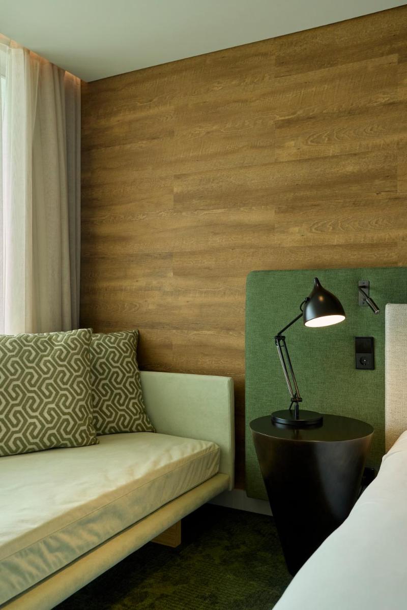Uma cama ou camas num quarto em Octant Ponta Delgada