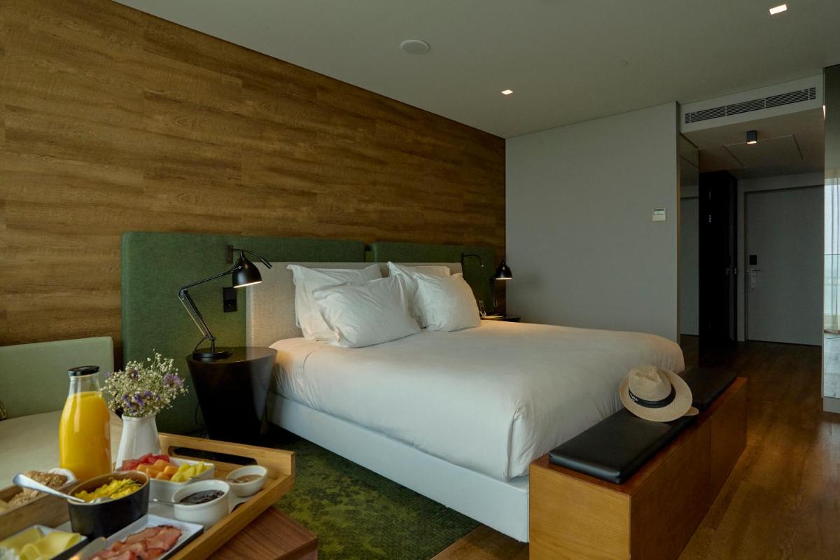 Uma cama ou camas num quarto em Octant Ponta Delgada