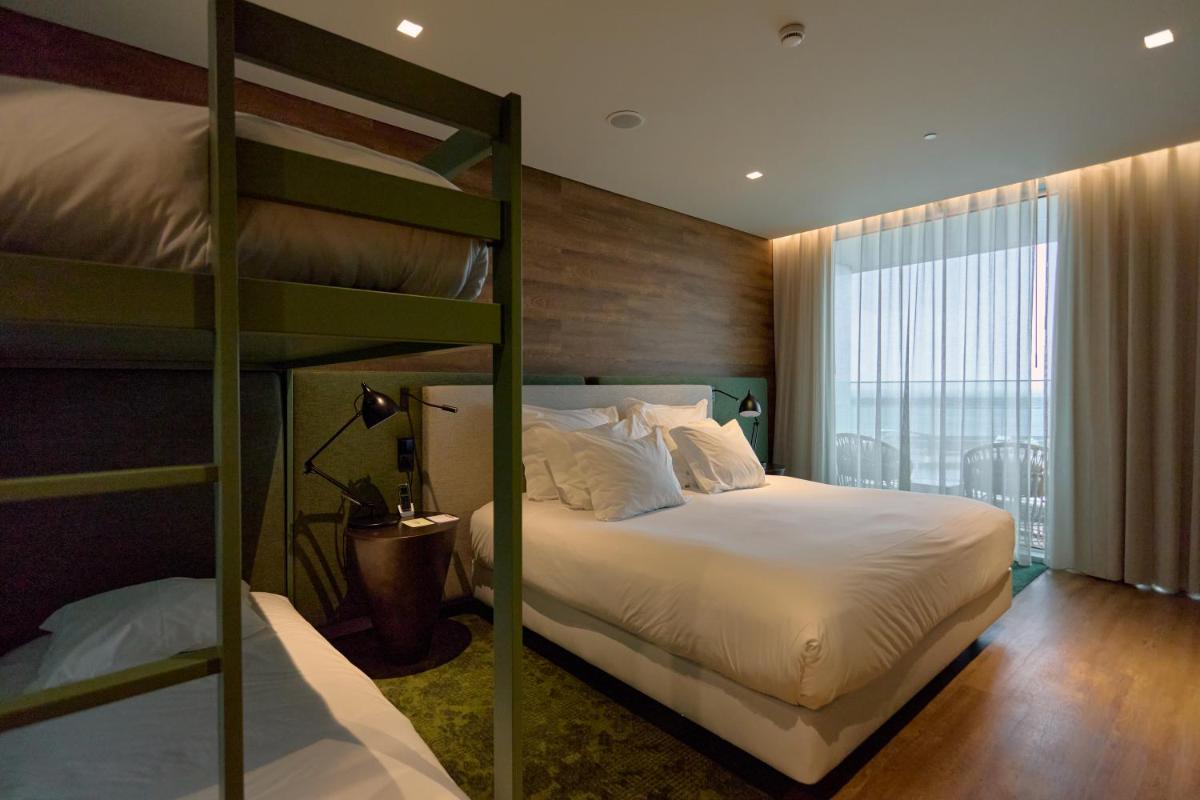 Uma cama ou camas num quarto em Octant Ponta Delgada