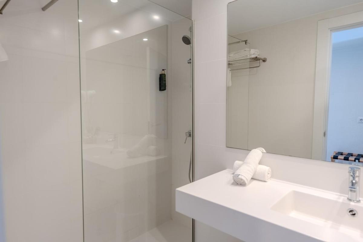 Un baño de Flamboyan Caribe Hotel & Spa