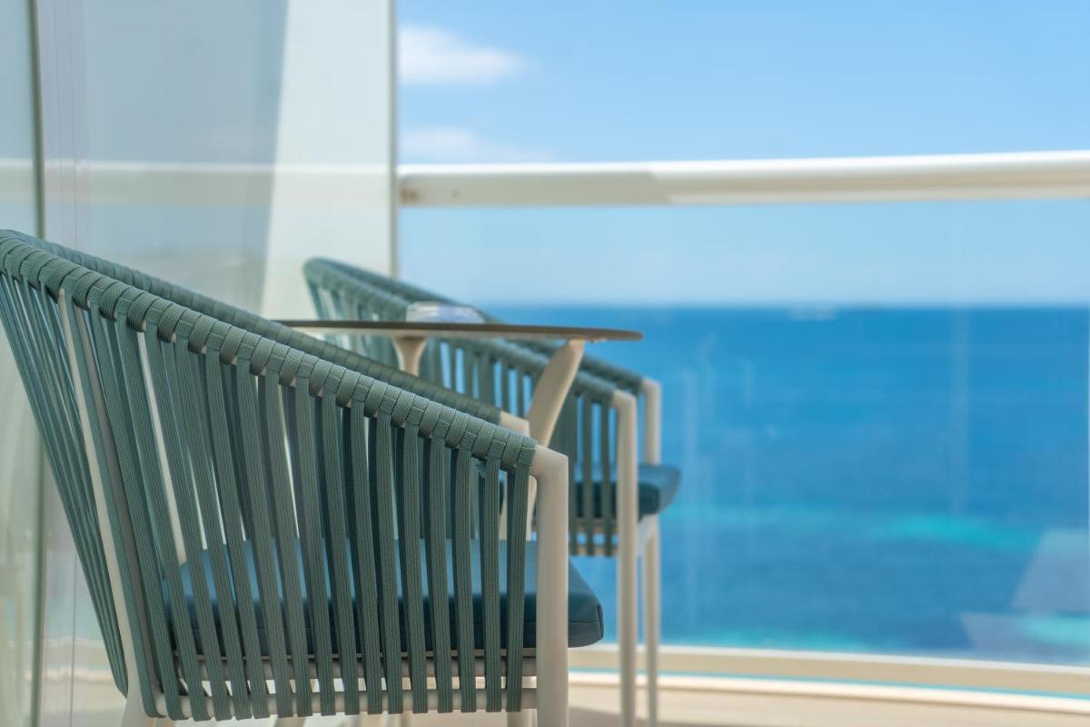 Un balcón o terraza de Flamboyan Caribe Hotel & Spa