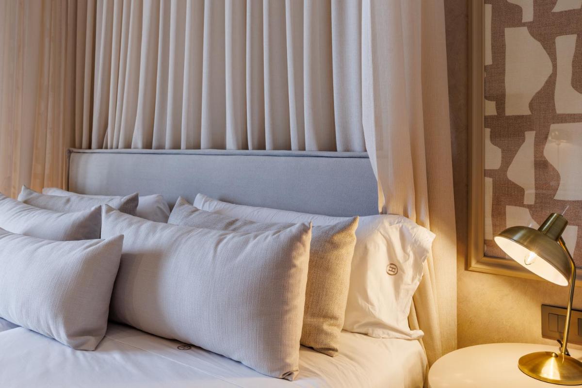 Cama o camas de una habitación en Hoposa Uyal