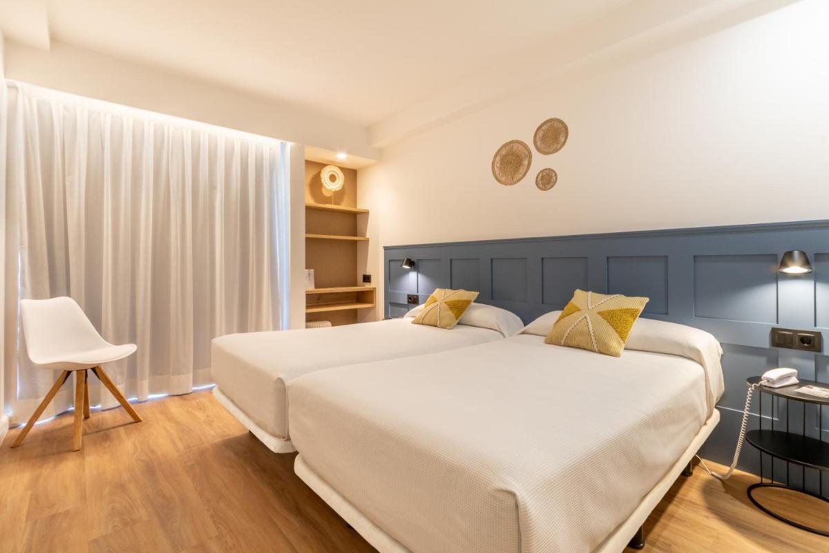 Cama o camas de una habitación en Hotel Anabel