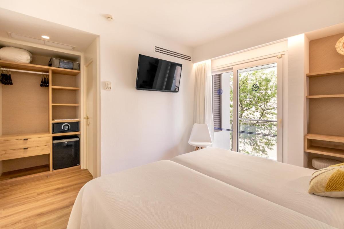 Cama o camas de una habitación en Hotel Anabel