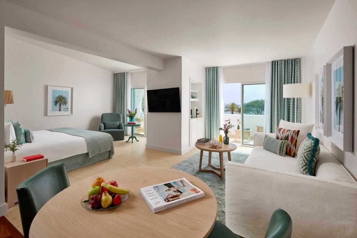 Uma cama ou camas num quarto em Vila Vita Parc