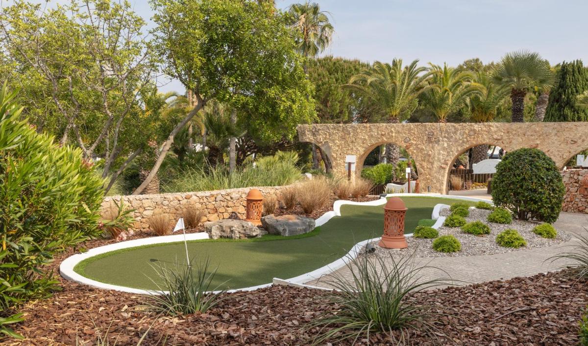 Um jardim no exterior de Vila Vita Parc