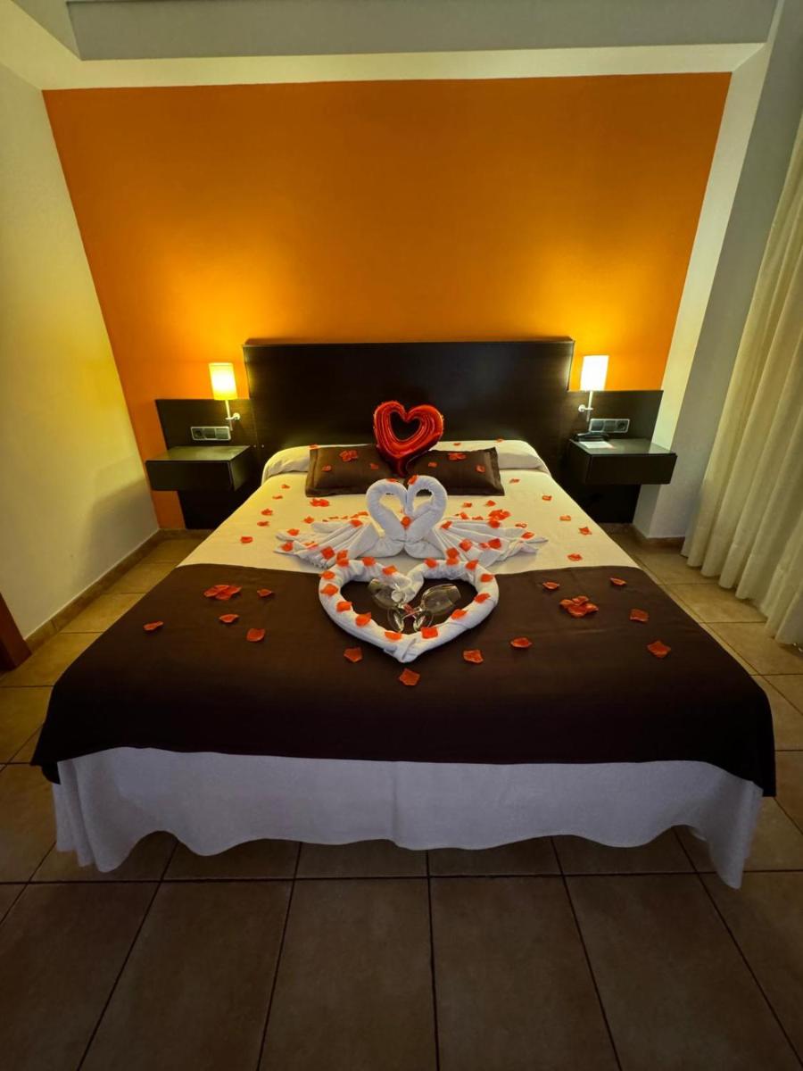 Cama o camas de una habitación en Hotel Spa Pinar del Mar