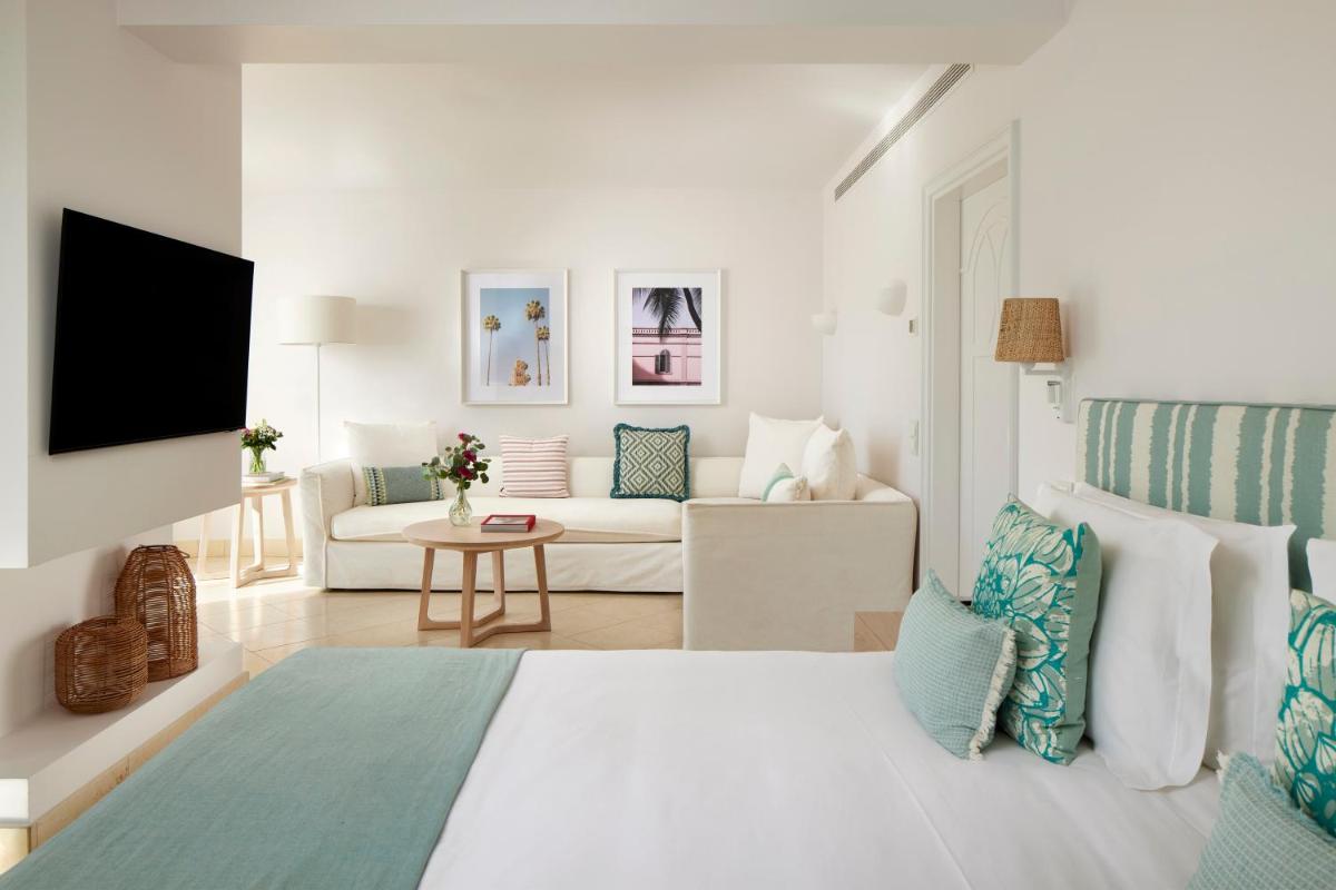 Uma cama ou camas num quarto em Vila Vita Parc