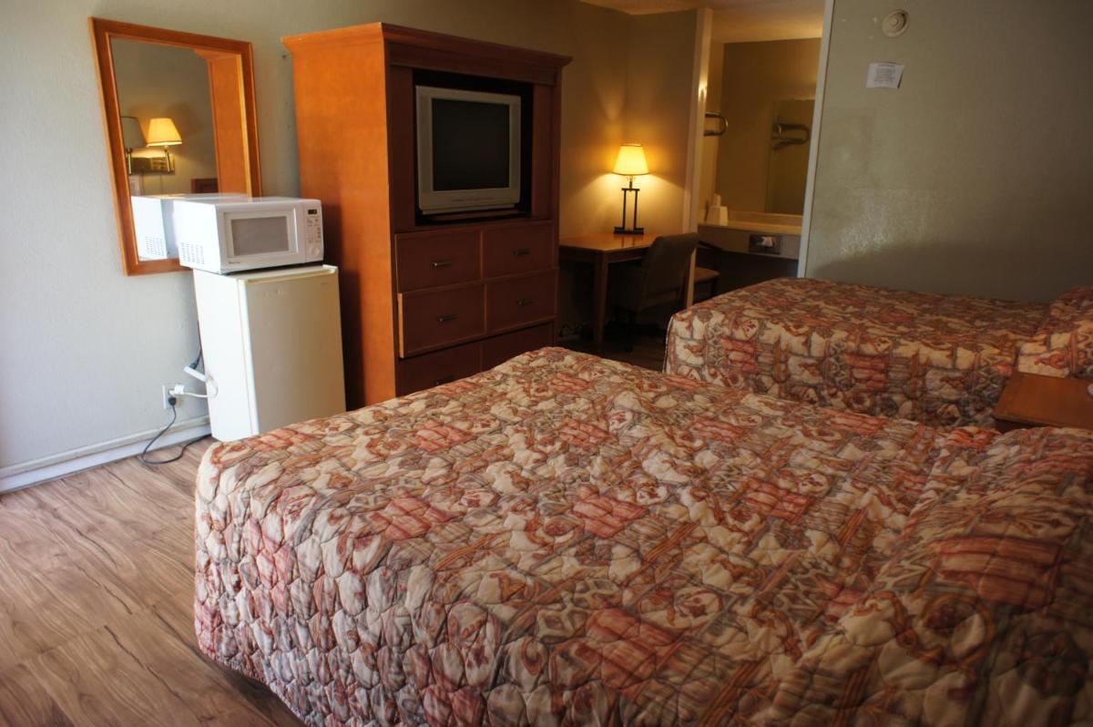 Executive Inn & Suites - Housity