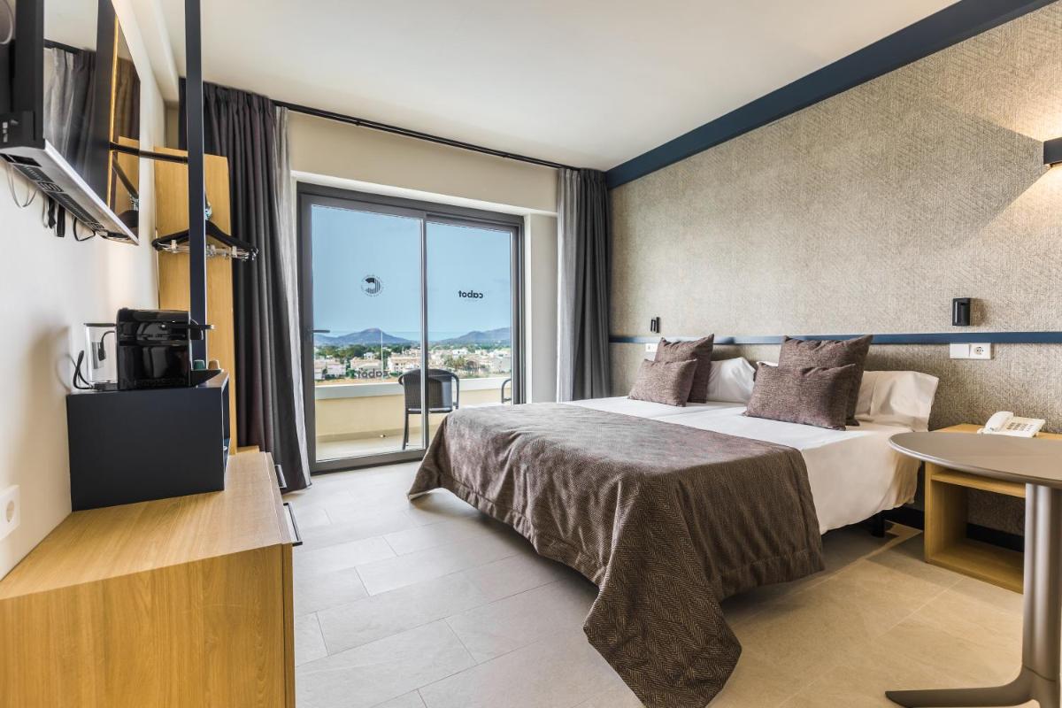 Cama o camas de una habitación en Cabot Pollensa Park Spa
