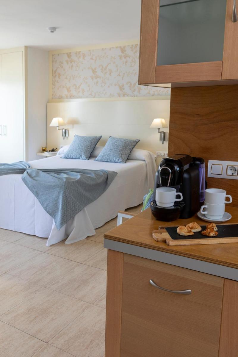 Cama o camas de una habitación en Hotel Spa Cap de Creus