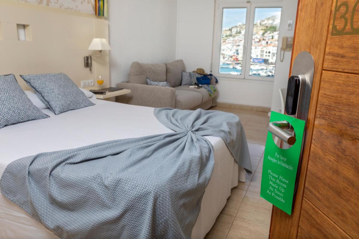 Cama o camas de una habitación en Hotel Spa Cap de Creus