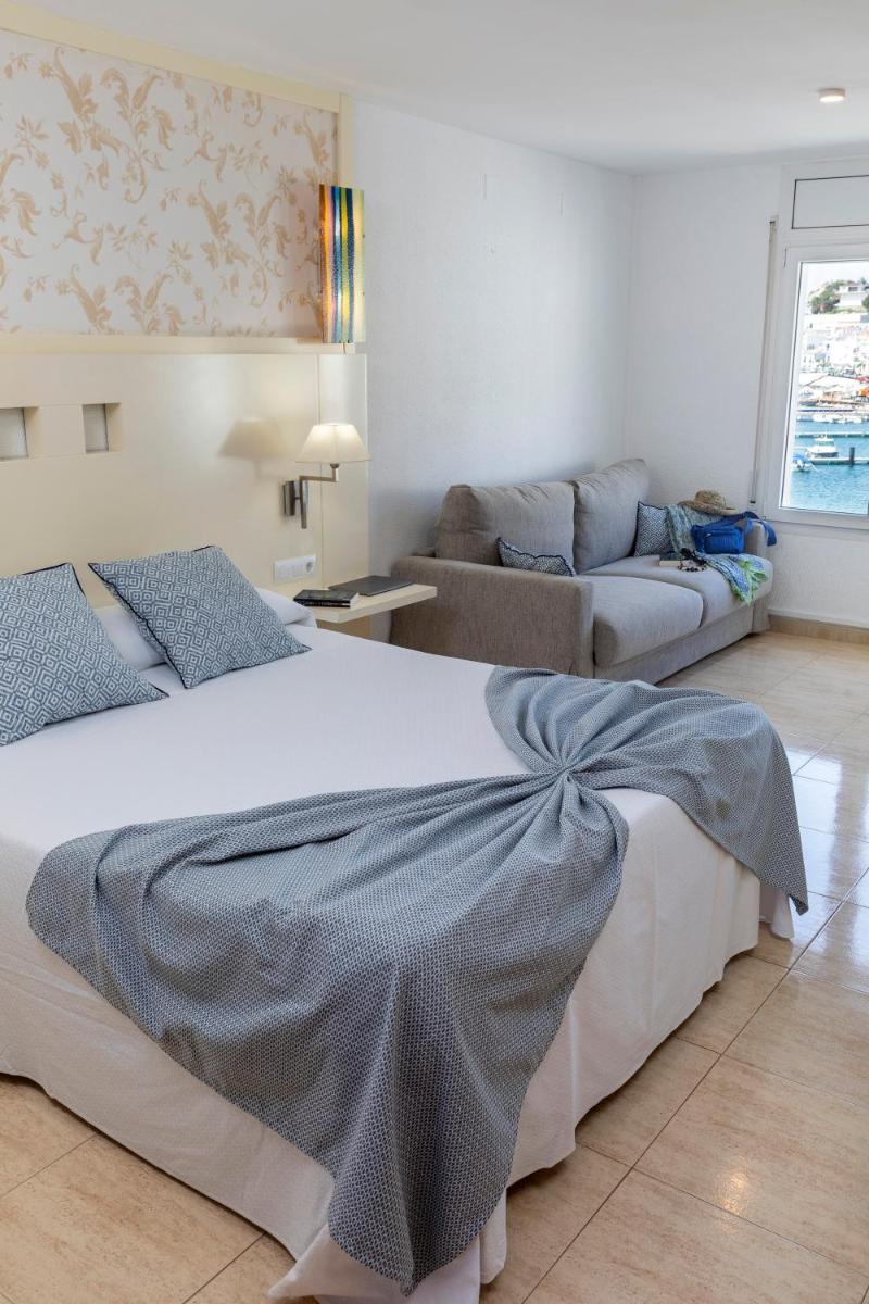 Cama o camas de una habitación en Hotel Spa Cap de Creus