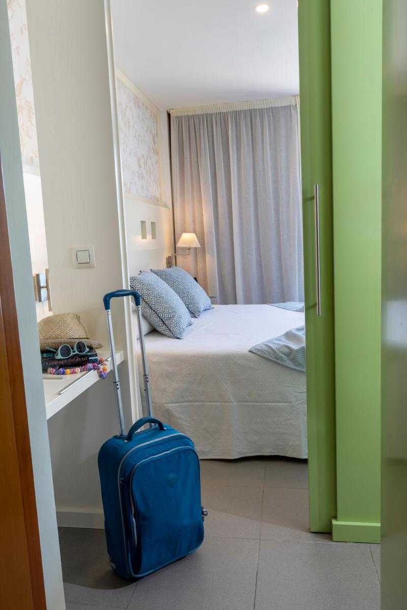 Cama o camas de una habitación en Hotel Spa Cap de Creus