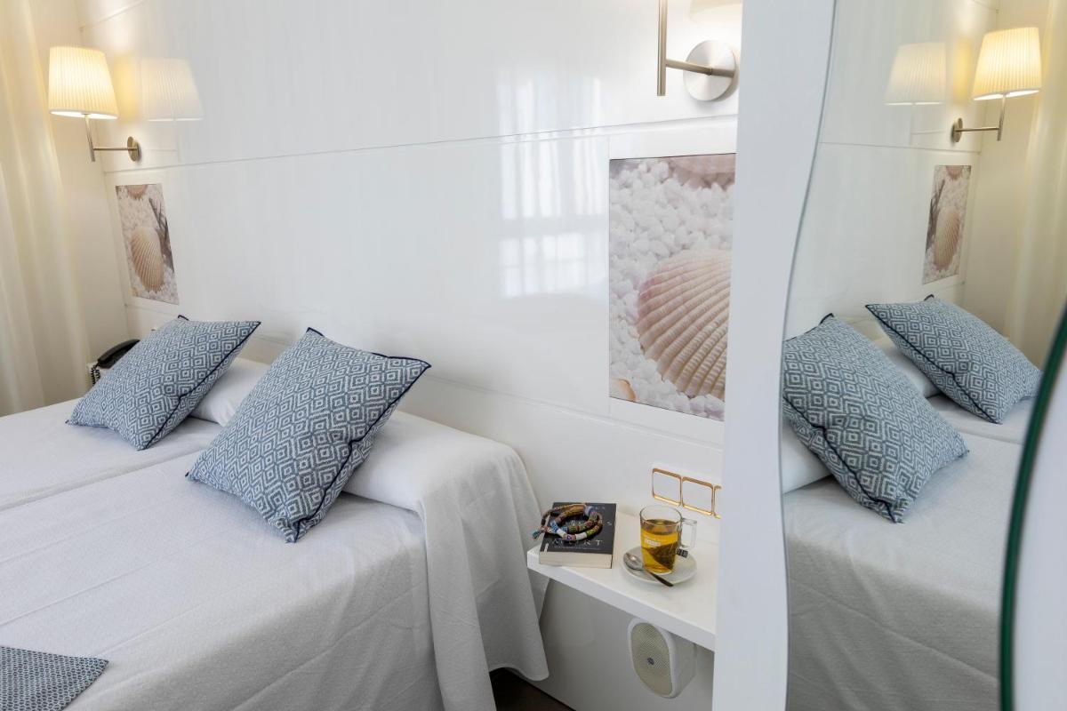 Cama o camas de una habitación en Hotel Spa Cap de Creus