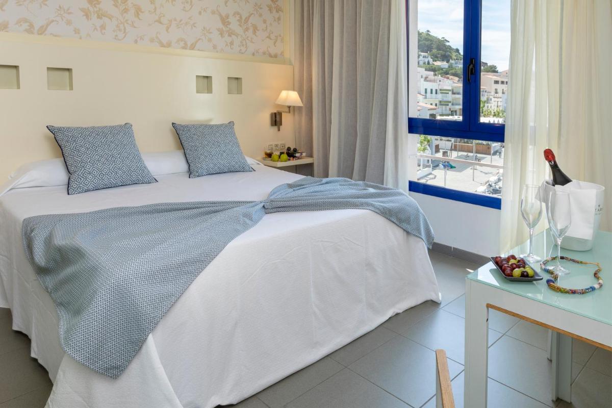 Cama o camas de una habitación en Hotel Spa Cap de Creus