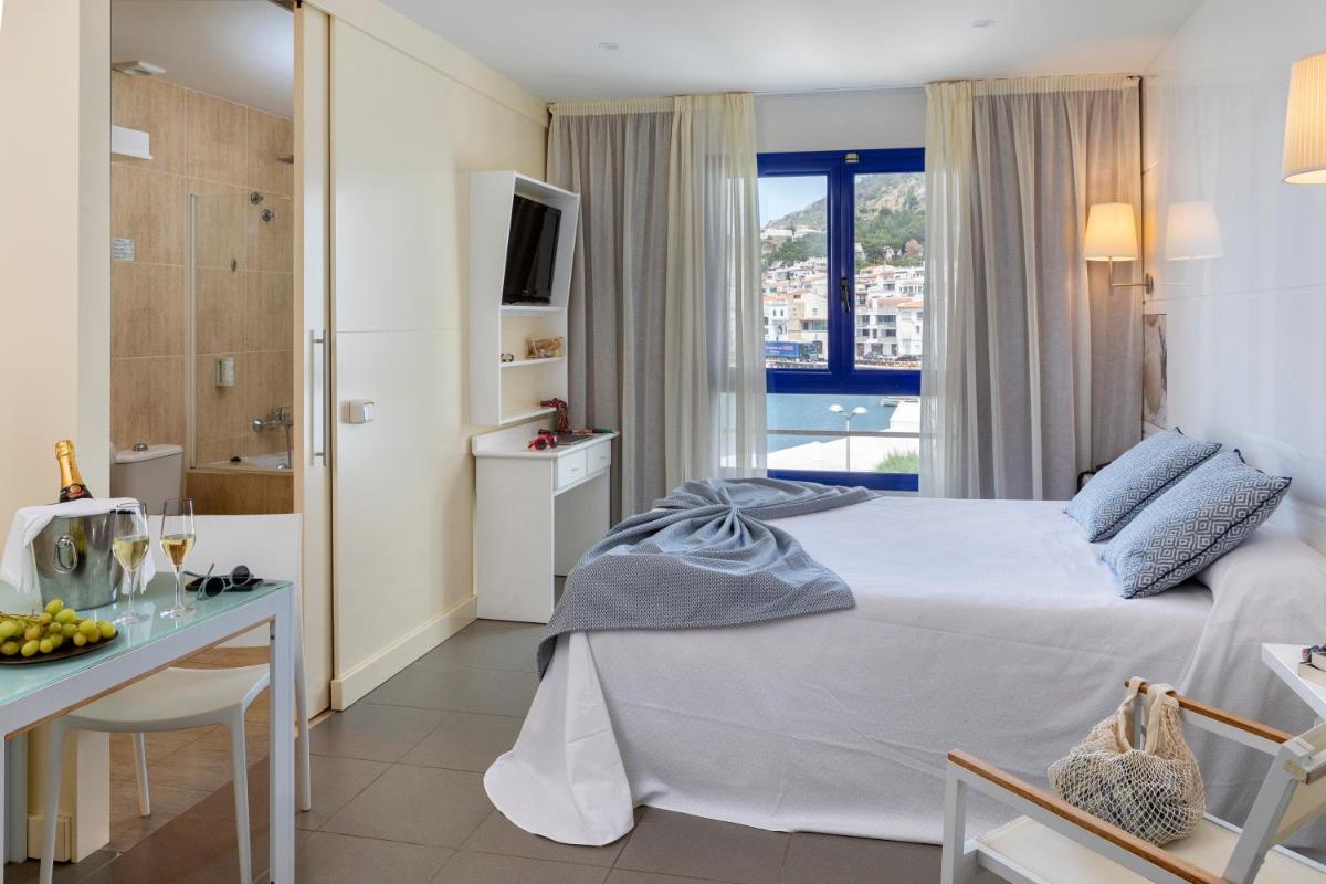 Cama o camas de una habitación en Hotel Spa Cap de Creus