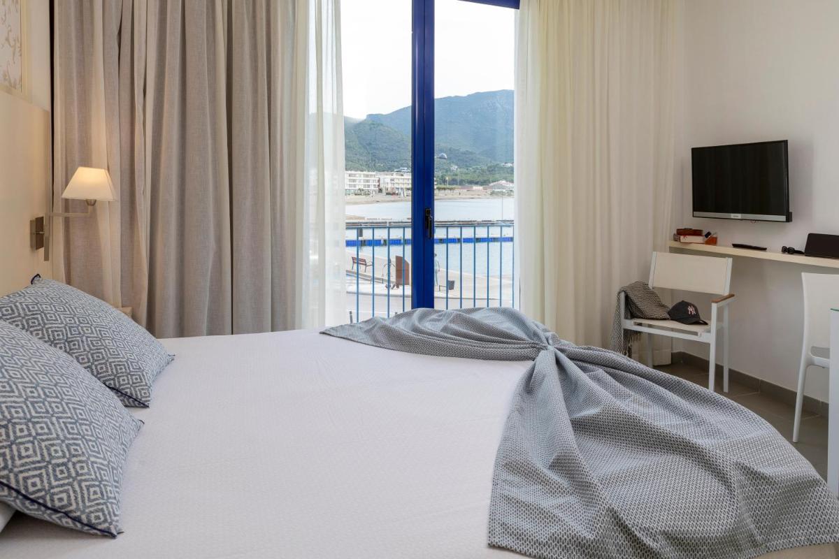 Cama o camas de una habitación en Hotel Spa Cap de Creus
