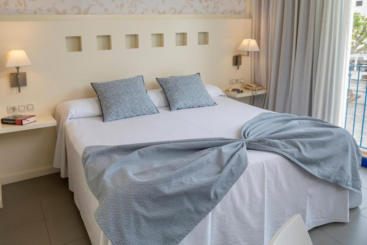 Cama o camas de una habitación en Hotel Spa Cap de Creus