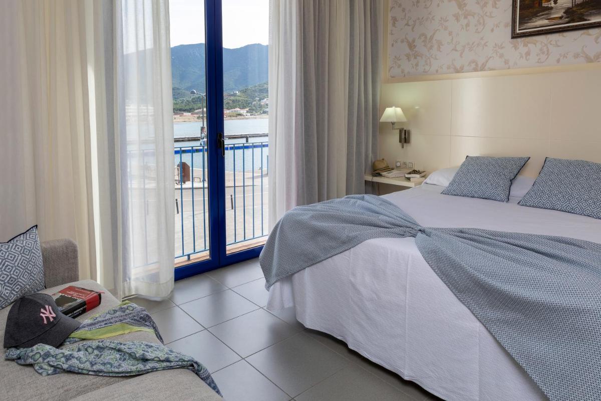Cama o camas de una habitación en Hotel Spa Cap de Creus