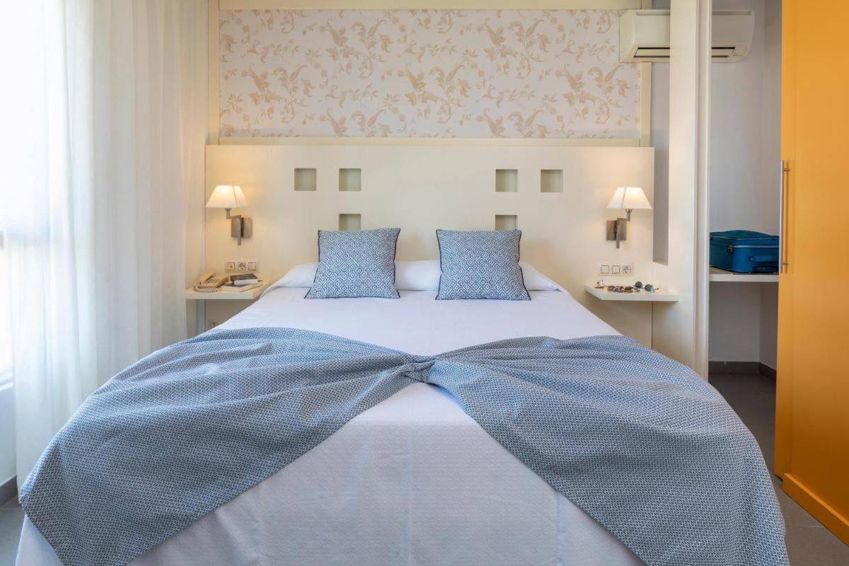 Cama o camas de una habitación en Hotel Spa Cap de Creus