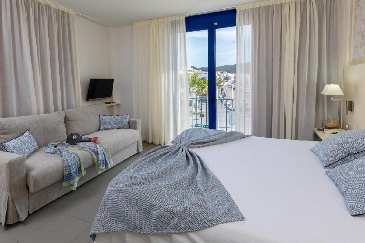 Cama o camas de una habitación en Hotel Spa Cap de Creus