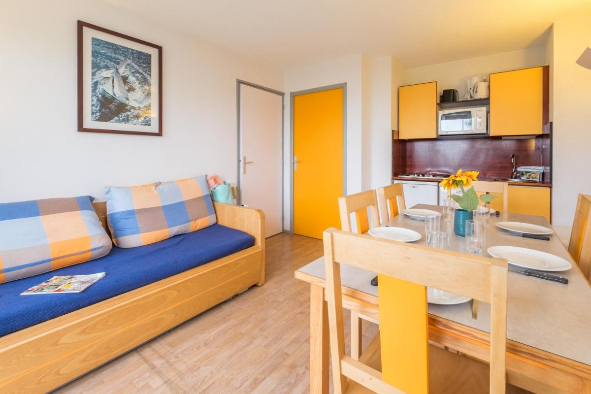 Cuisine ou kitchenette dans l'établissement Résidence Pierre & Vacances la Corniche de la Plage