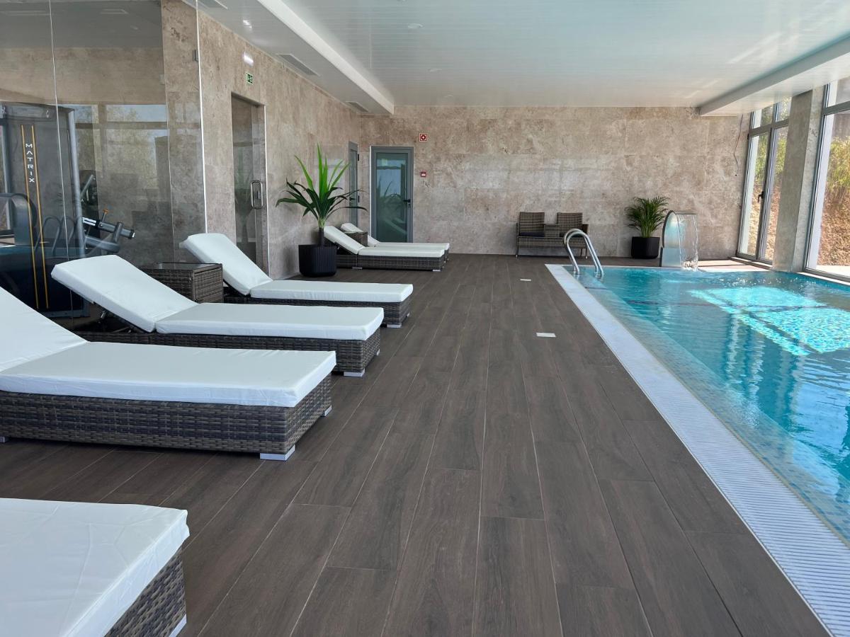 A piscina em ou perto de Hotel O Gato & Spa